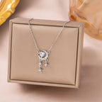 Collier cœur et pampille mobile sur chaîne fine dorée
