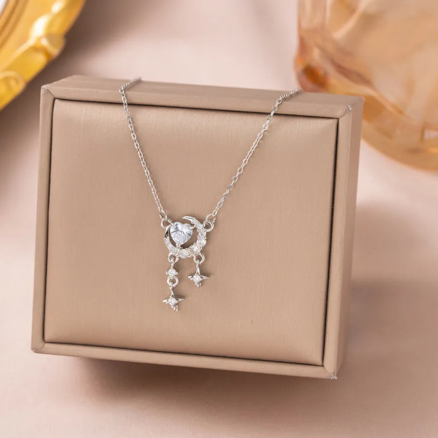 Collier cœur et pampille mobile sur chaîne fine dorée