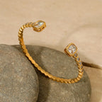 Jonc très fin et épuré en acier inoxydable doré