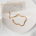 Bracelet géométrique épuré en acier doré — vue 6