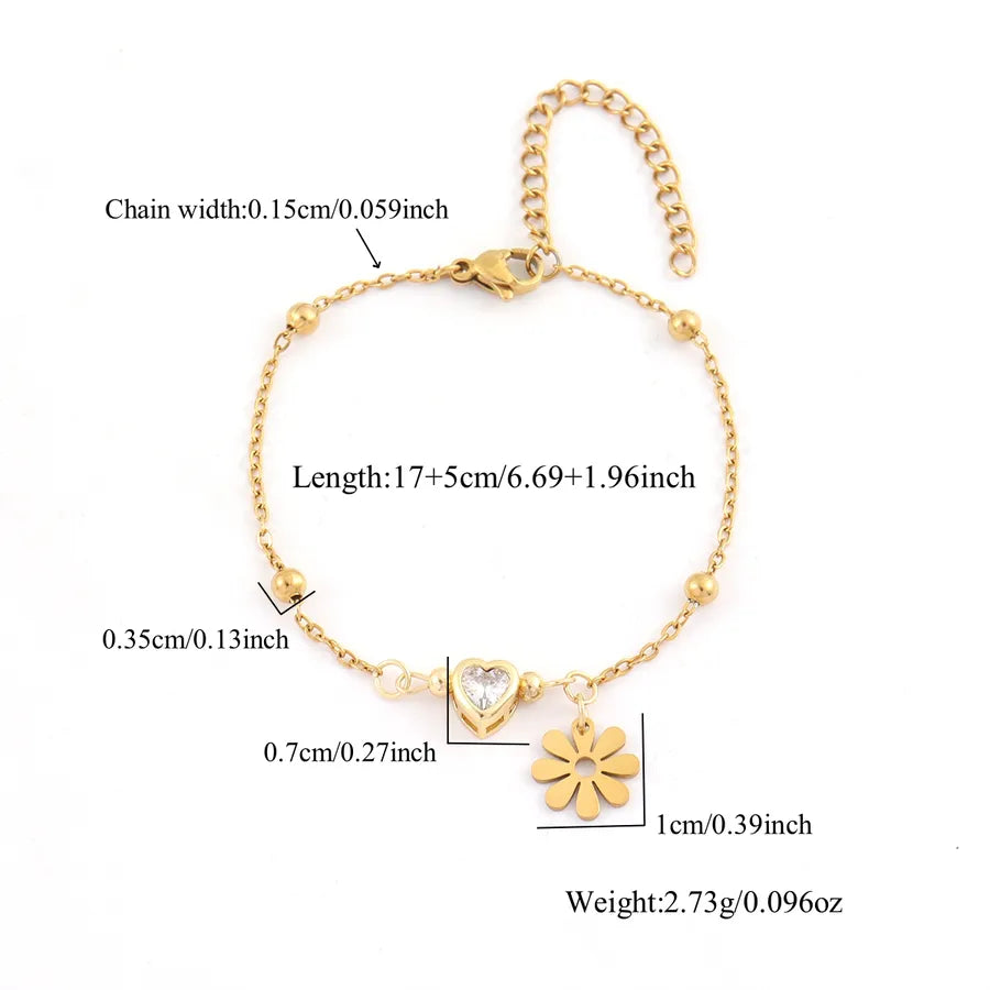 Bracelet marguerites émaillées sur chaîne dorée — vue 2