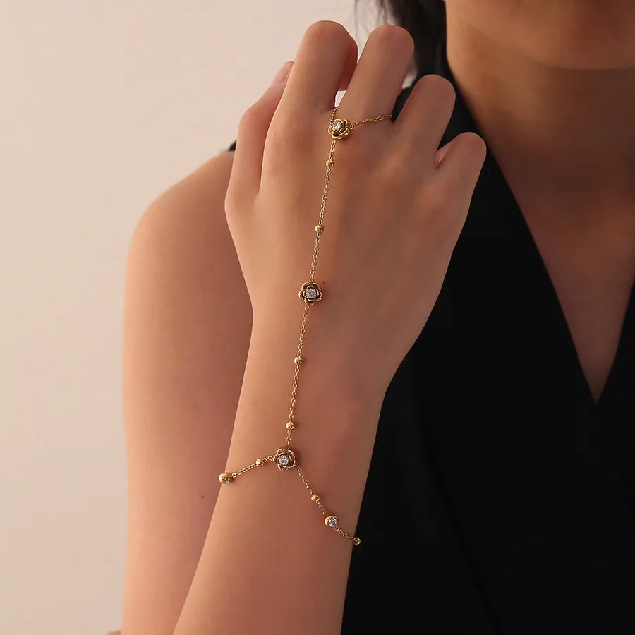 Bracelet de main à motif fleur, acier inoxydable doré