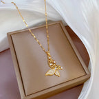 Collier papillon ajouré serti, chaîne dorée — vue 2