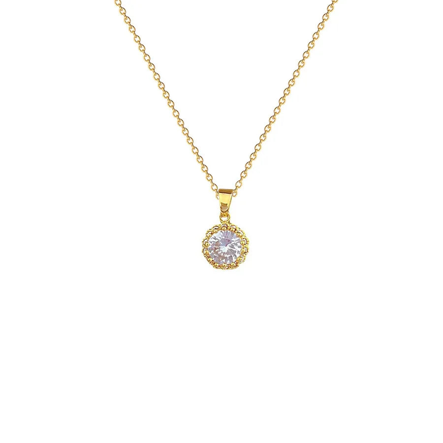 Collier à pendentif rond serti d'un zircon, chaîne dorée