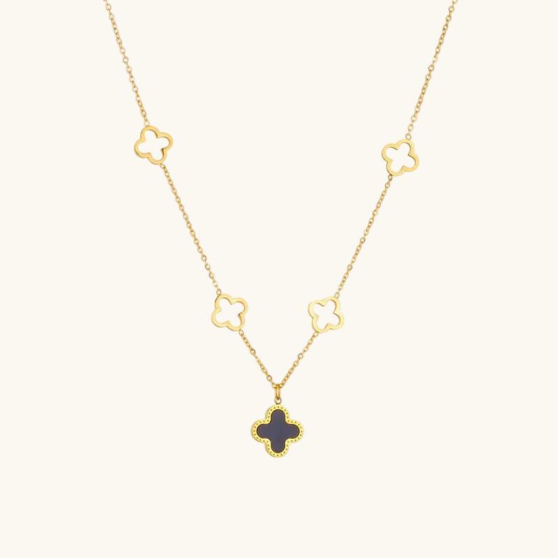 Collier fleur de nacre noire et blanche sur chaîne dorée