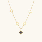 Collier fleur de nacre noire et blanche sur chaîne dorée
