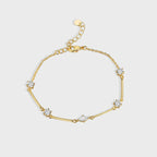 Bracelet en laiton doré serti de zircons