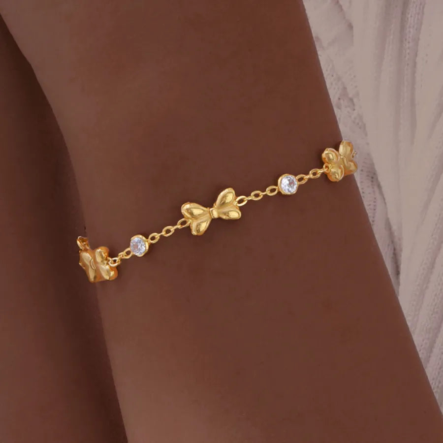 Bracelet cœur et nœud papillon, chaîne dorée — vue 8