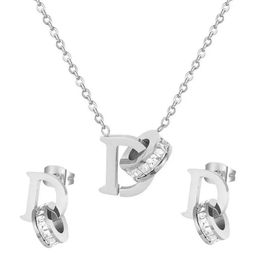 Pendentif pavé de zircons, acier inoxydable doré — vue 8