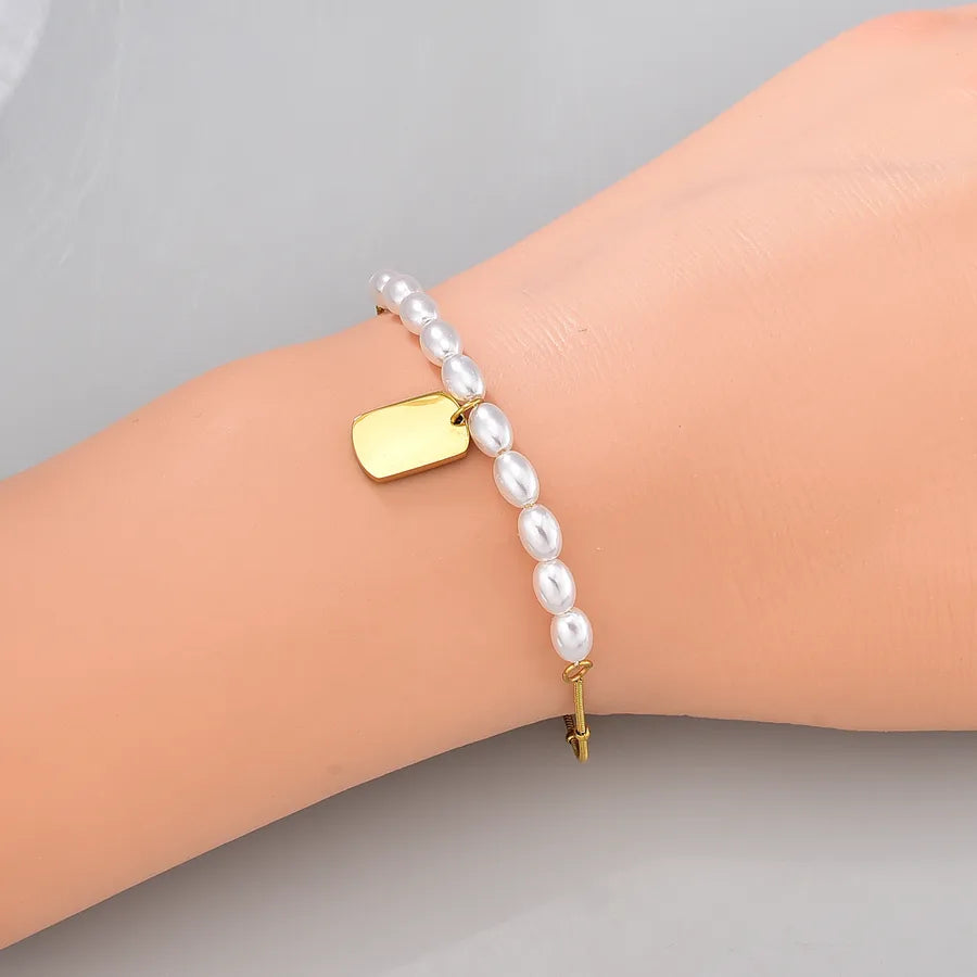 Bracelet perle et maille vénitienne en acier inoxydable doré