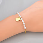 Bracelet perle et maille vénitienne en acier inoxydable doré