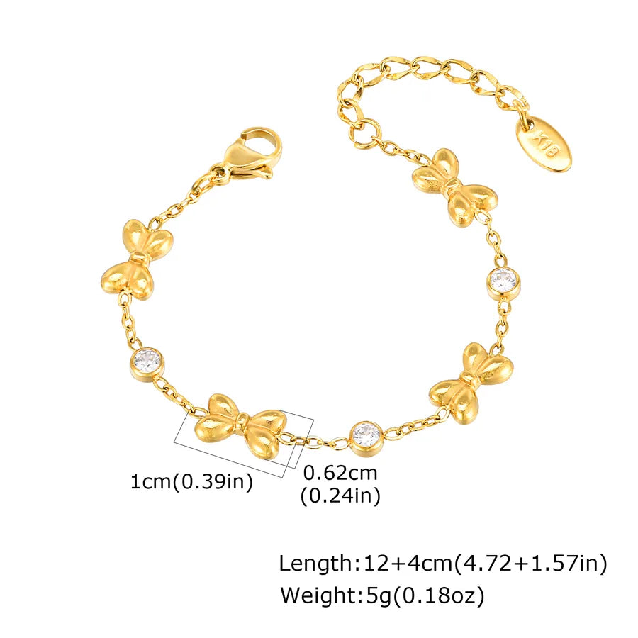 Bracelet cœur et nœud papillon, chaîne dorée — vue 2