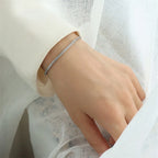 Bracelet géométrique minimaliste, acier doré — vue 3