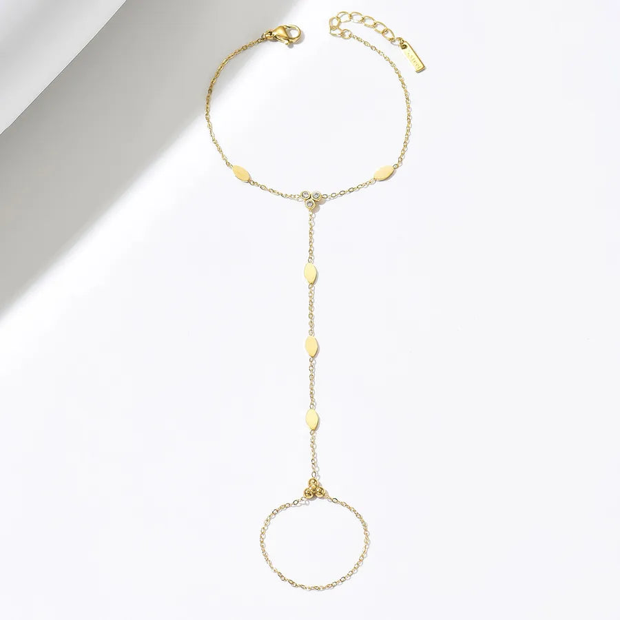 Bracelet feuille nervurée sur chaîne dorée