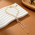 Bracelet de main cœur serti de zircons, acier doré