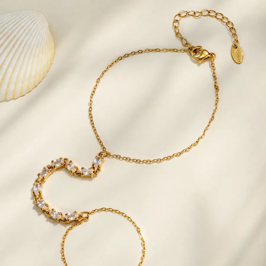 Bracelet à ligne continue de zircons sertis, acier inoxydable