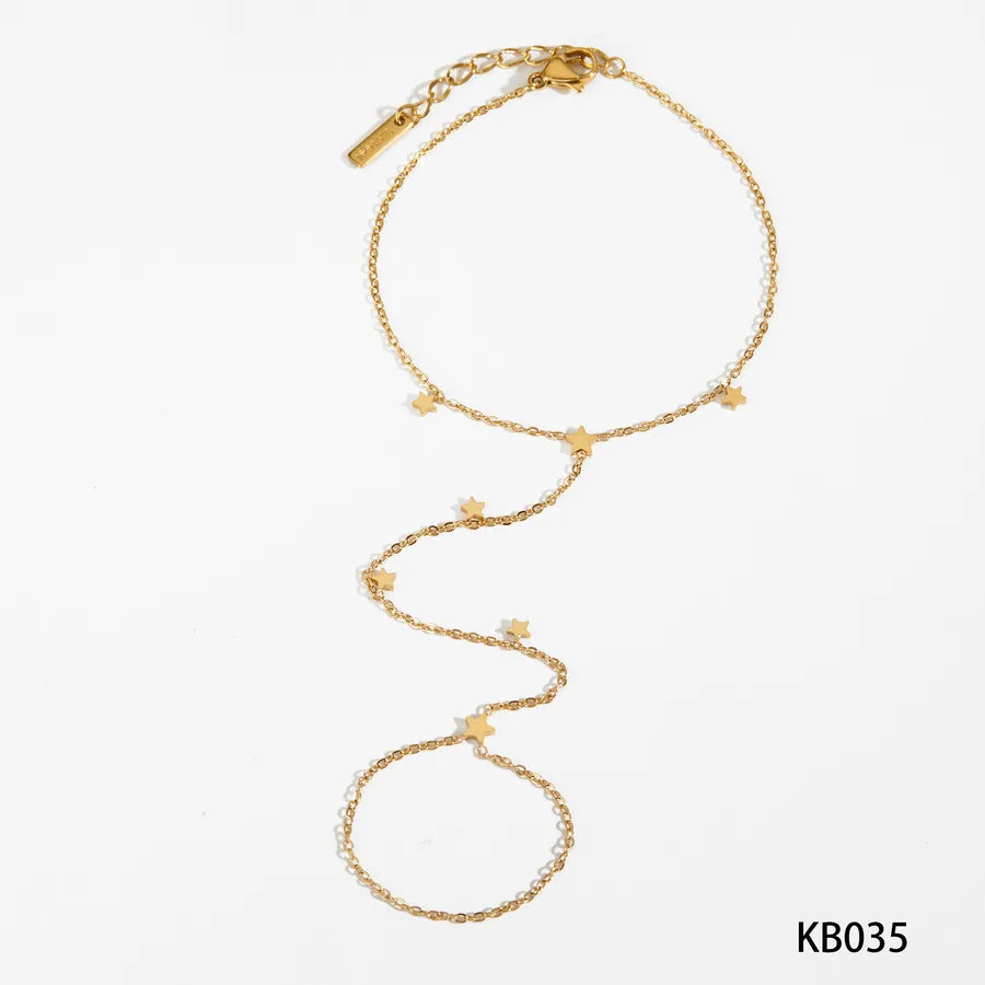 Bracelet étoile sur chaîne fine dorée — vue 9