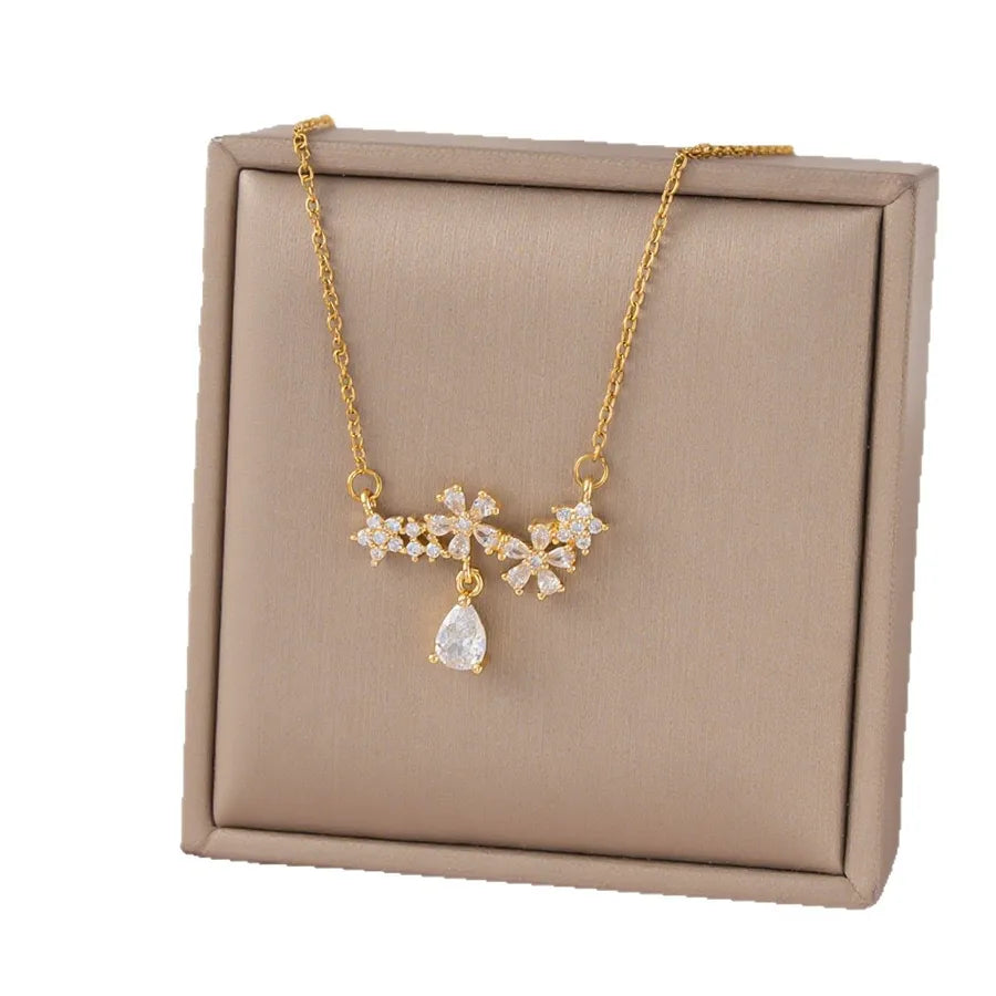 Collier fleur dorée sur chaîne en acier inoxydable 304