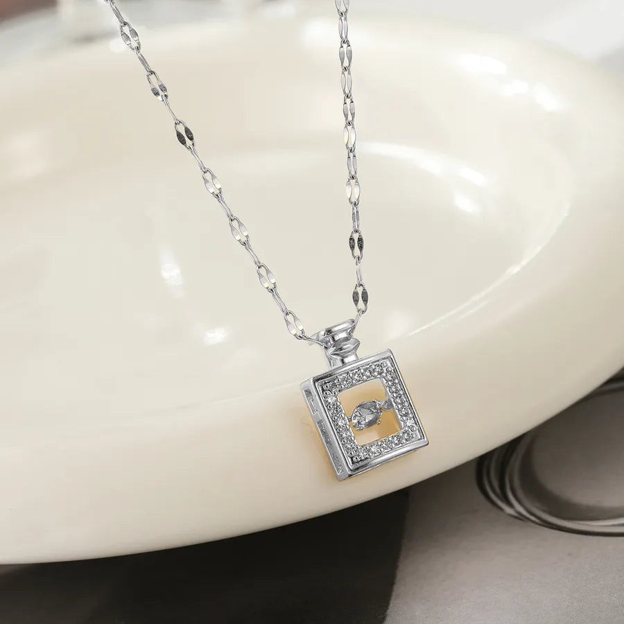 Collier pendentif flacon de parfum, chaîne dorée — vue 5