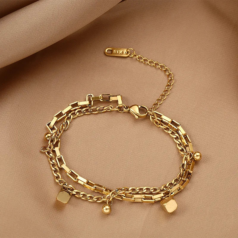 Bracelet uni lisse en acier inoxydable doré — vue 6