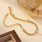 Bracelet à maillons facettés, acier doré — vue 4