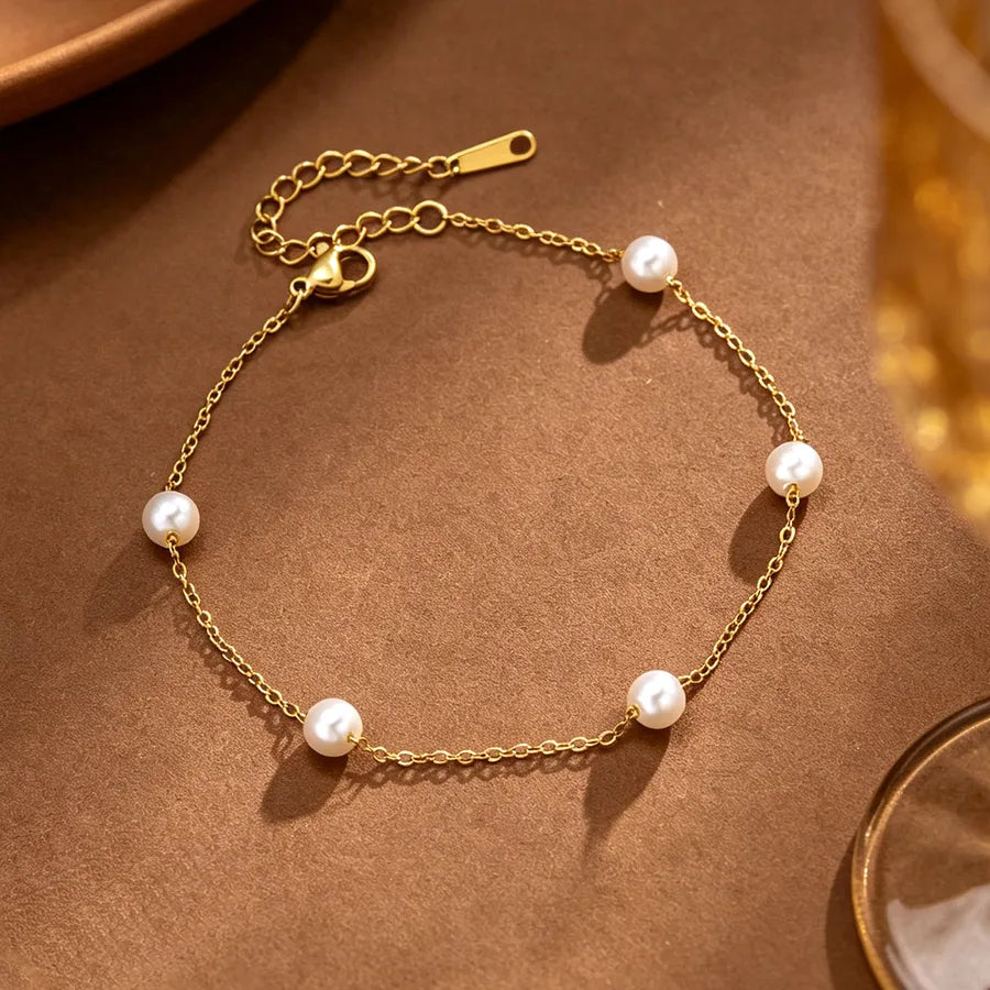 Bracelet cœur au motif tressé sur chaîne fine dorée