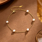 Bracelet cœur au motif tressé sur chaîne fine dorée