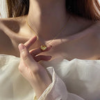 Collier cœur sur maille serpent lisse, acier inoxydable doré