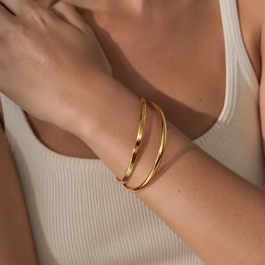 Bracelet aux maillons irréguliers en acier inoxydable doré