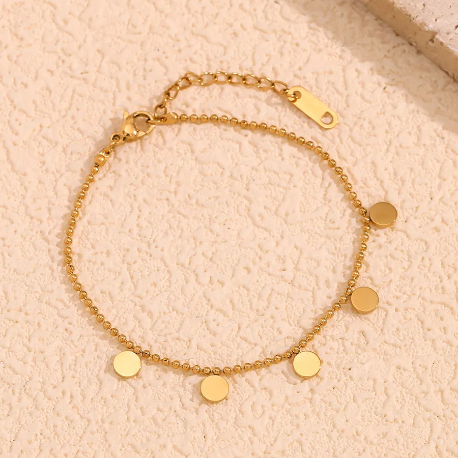 Bracelet pastille à graver sur chaîne à billes dorée