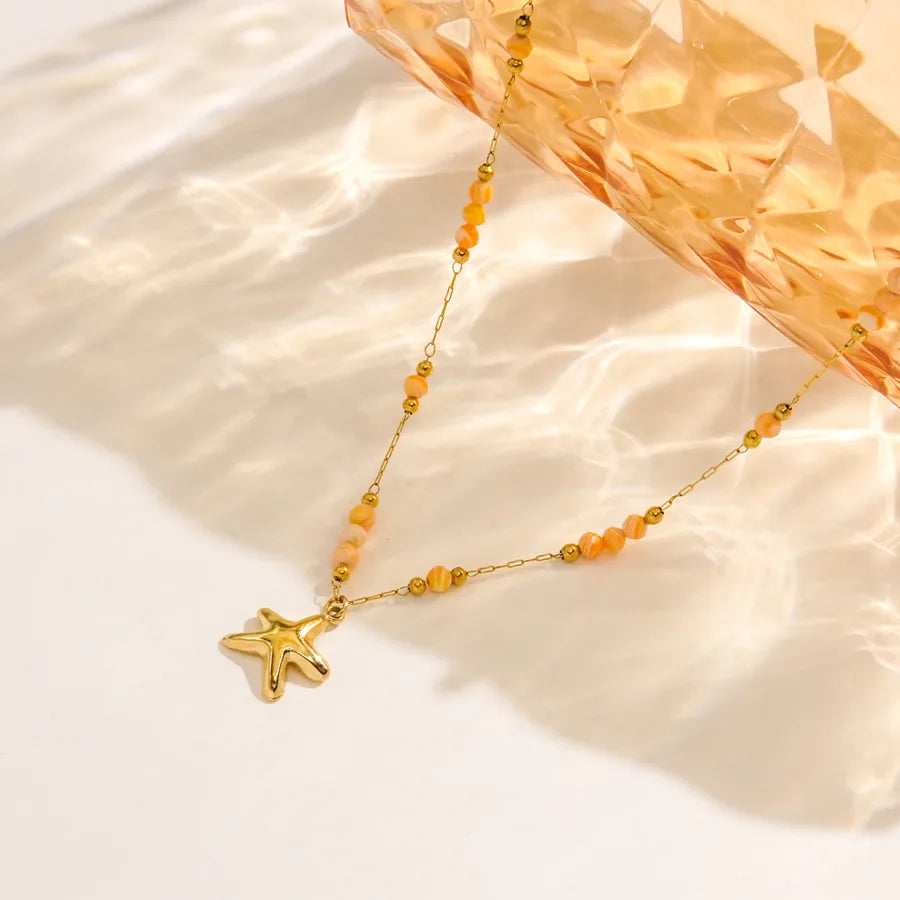 Collier étoile de mer, chaîne fine dorée — vue 2
