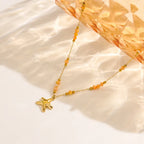 Collier étoile de mer, chaîne fine dorée — vue 2