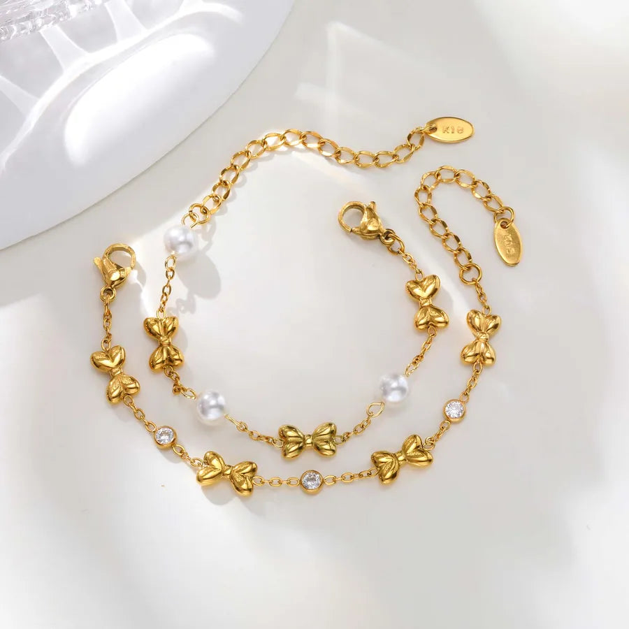Bracelet cœur et nœud papillon, chaîne dorée — vue 10