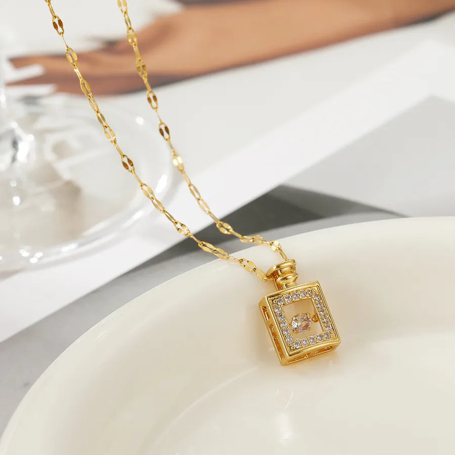 Collier pendentif flacon de parfum, chaîne dorée — vue 3