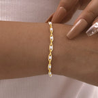 Bracelet à motif géométrique en cuivre doré