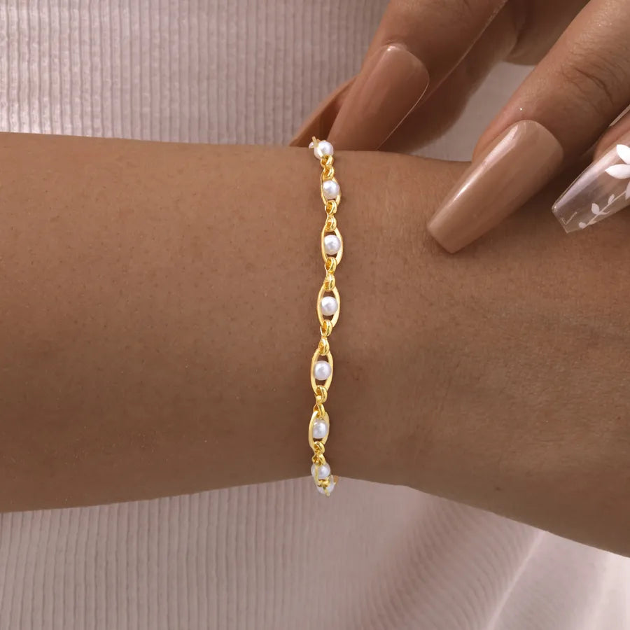 Bracelet à motif géométrique en cuivre doré