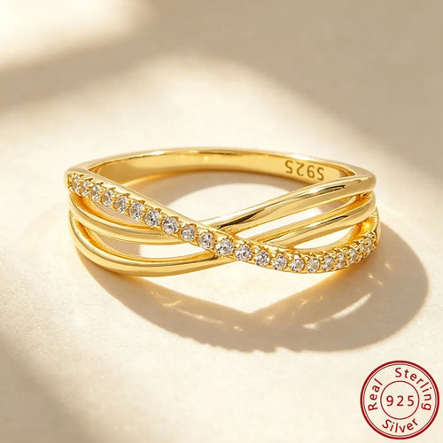 Bague croix sertie, finition or blanc