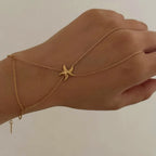 Bracelet de main étoile de mer relié à l'anneau, acier doré