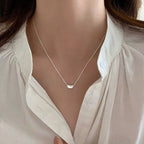 Collier pendentif graine porte-bonheur en argent 925