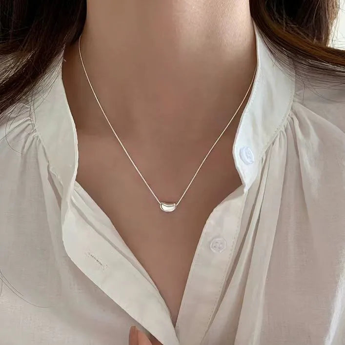 Collier pendentif graine porte-bonheur en argent 925