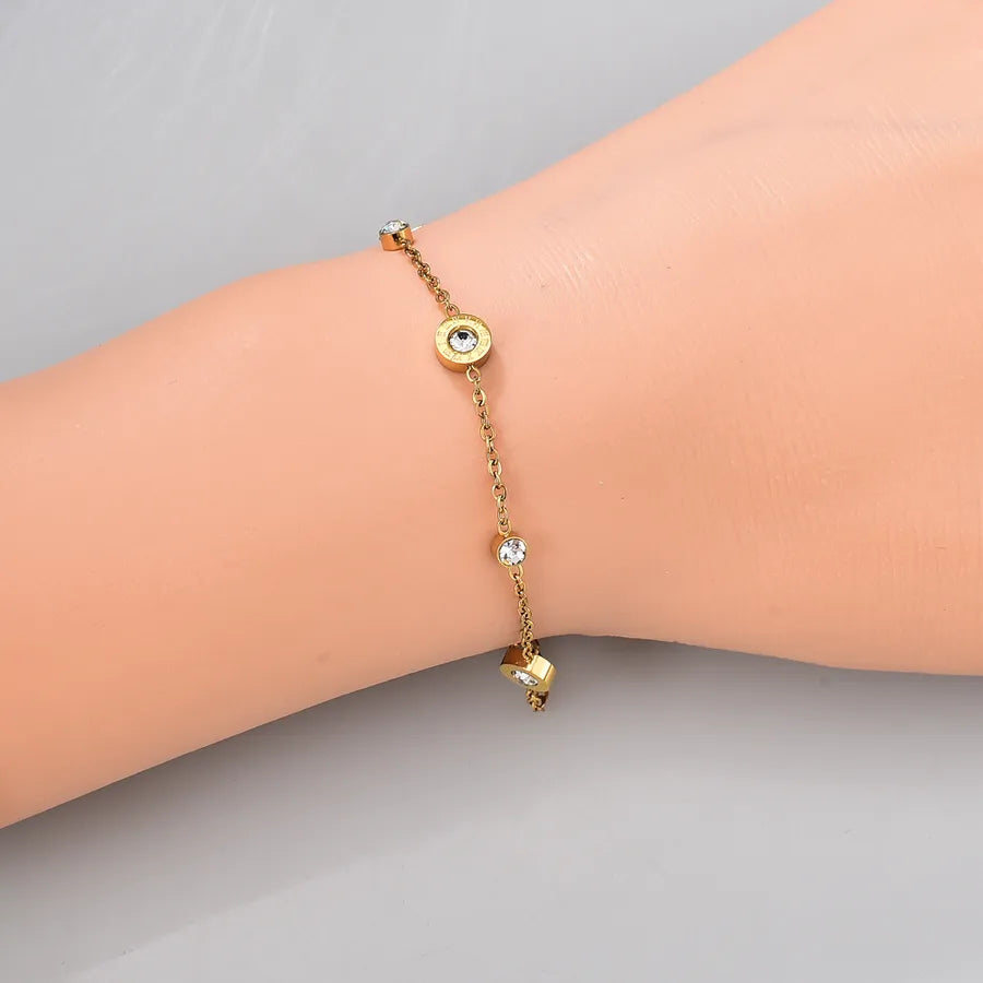 Bracelet à ligne de zircons épurée, acier inoxydable doré