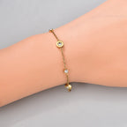 Bracelet à ligne de zircons épurée, acier inoxydable doré