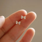 Boucles d'oreilles nœud délicat en argent massif 925