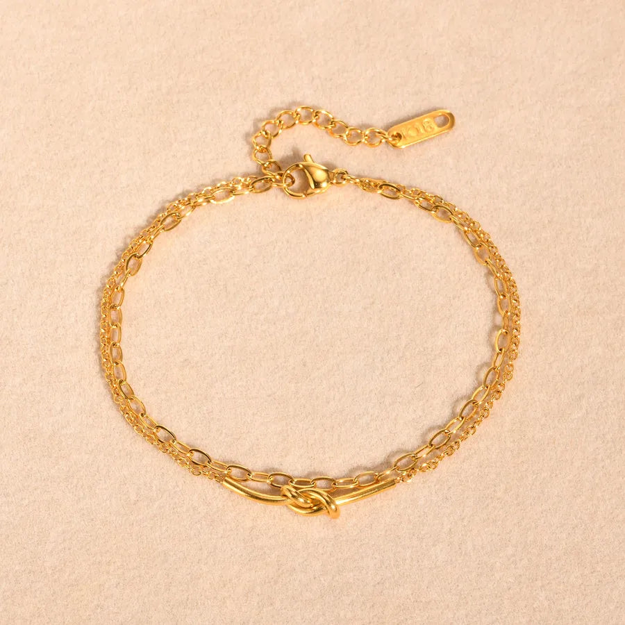 Bracelet nœud délicat sur chaîne dorée — vue 8