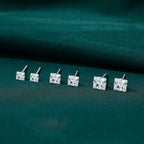 Puces d'oreilles géométriques serties de zircons
