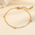 Collier à petits cœurs en relief, acier doré — vue 11