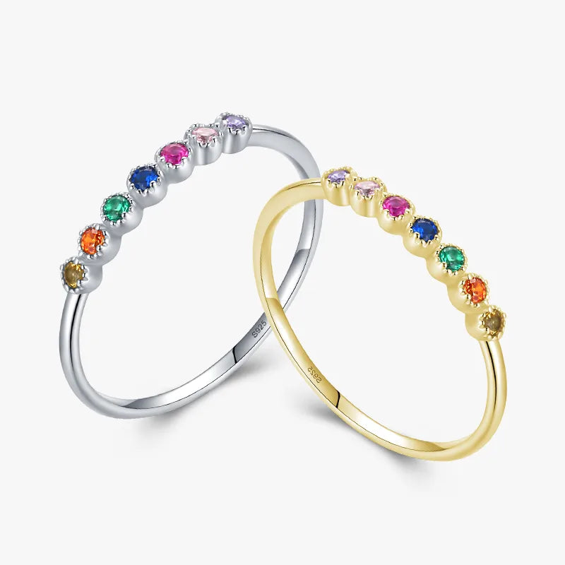 Bague en argent massif 925 à ligne de pierres colorées