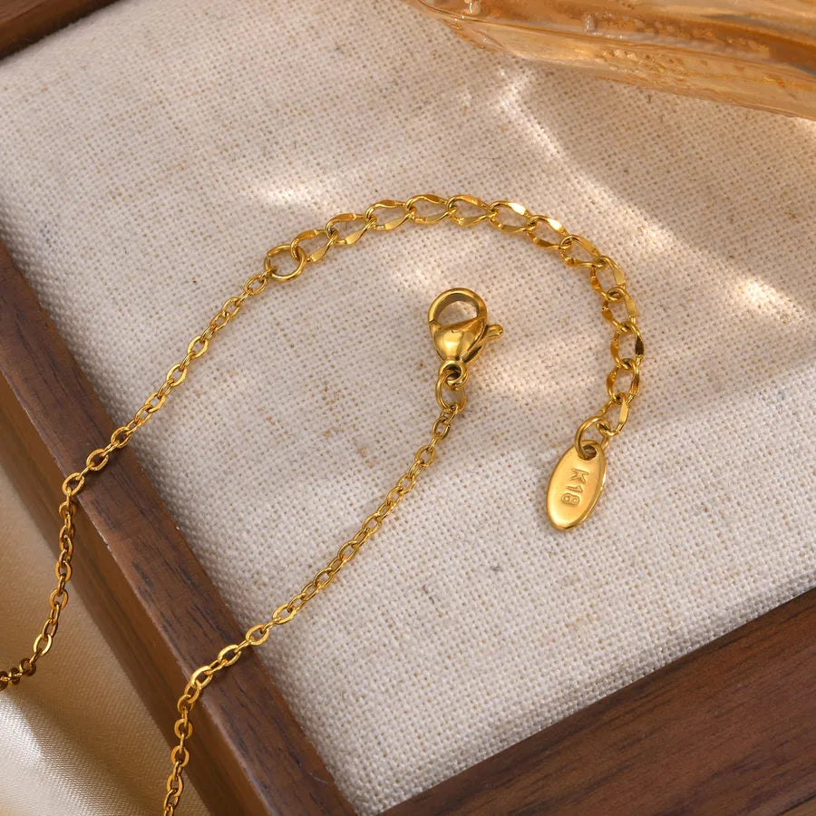 Collier fleur sertie de zircons, chaîne dorée — vue 5