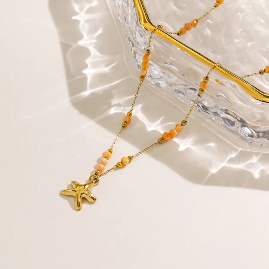 Collier étoile de mer, chaîne fine dorée — vue 4
