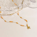 Collier étoile de mer, chaîne fine dorée — vue 3